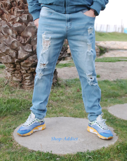 JEANS TROUÉ