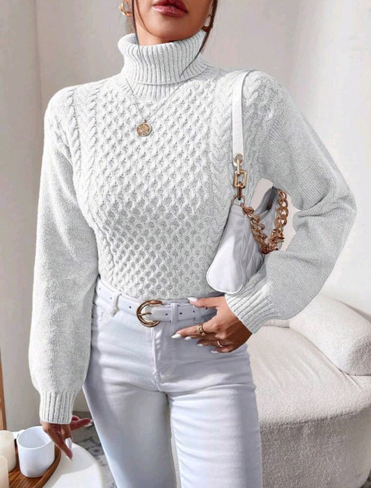 PULL EN TRICOT TORSADÉ